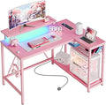 Bestier L Shaped Desk with Power Outlets & LED Lights Compact Corner Desk with Shelves Reversible Computer Desk with Hooks for Home Office Bedroom Small Space 106.5CM